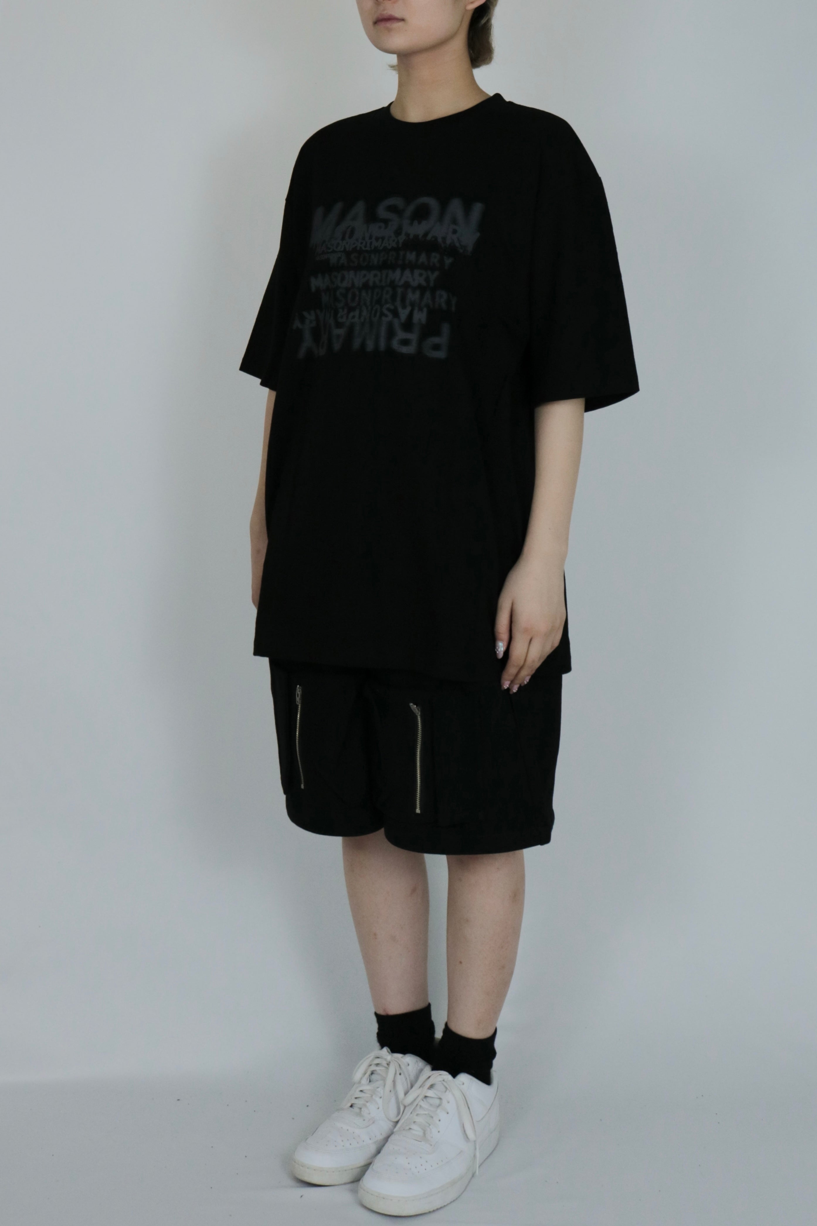 English lettering over size T