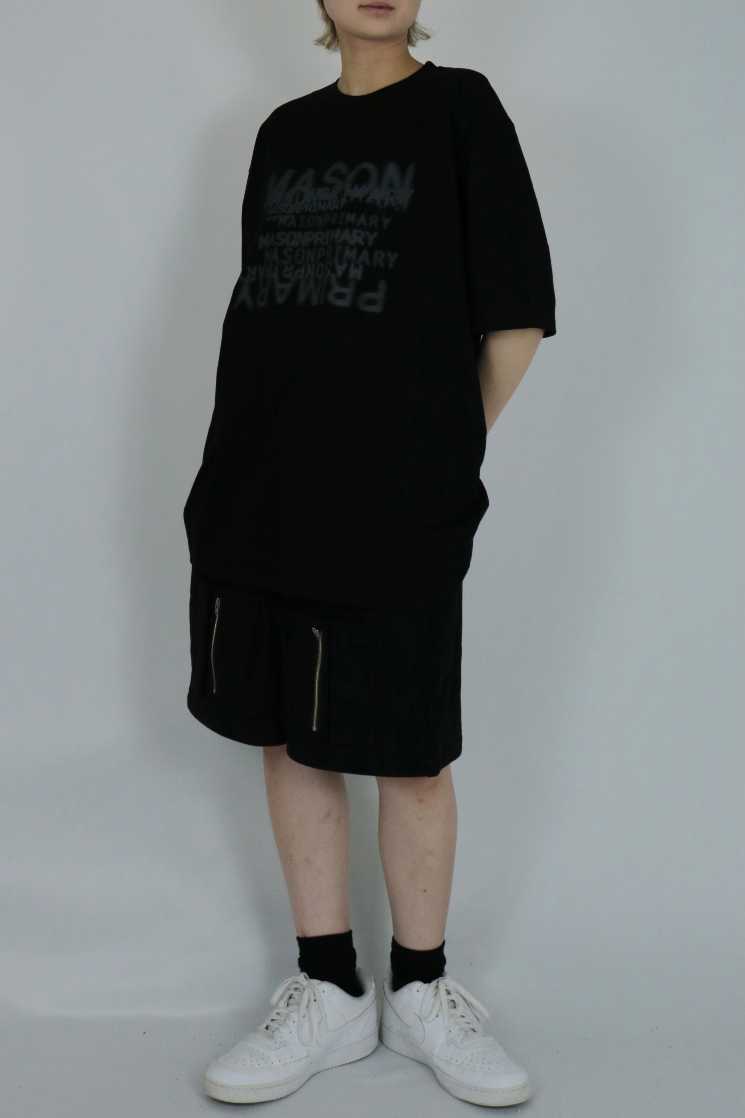 English lettering over size T