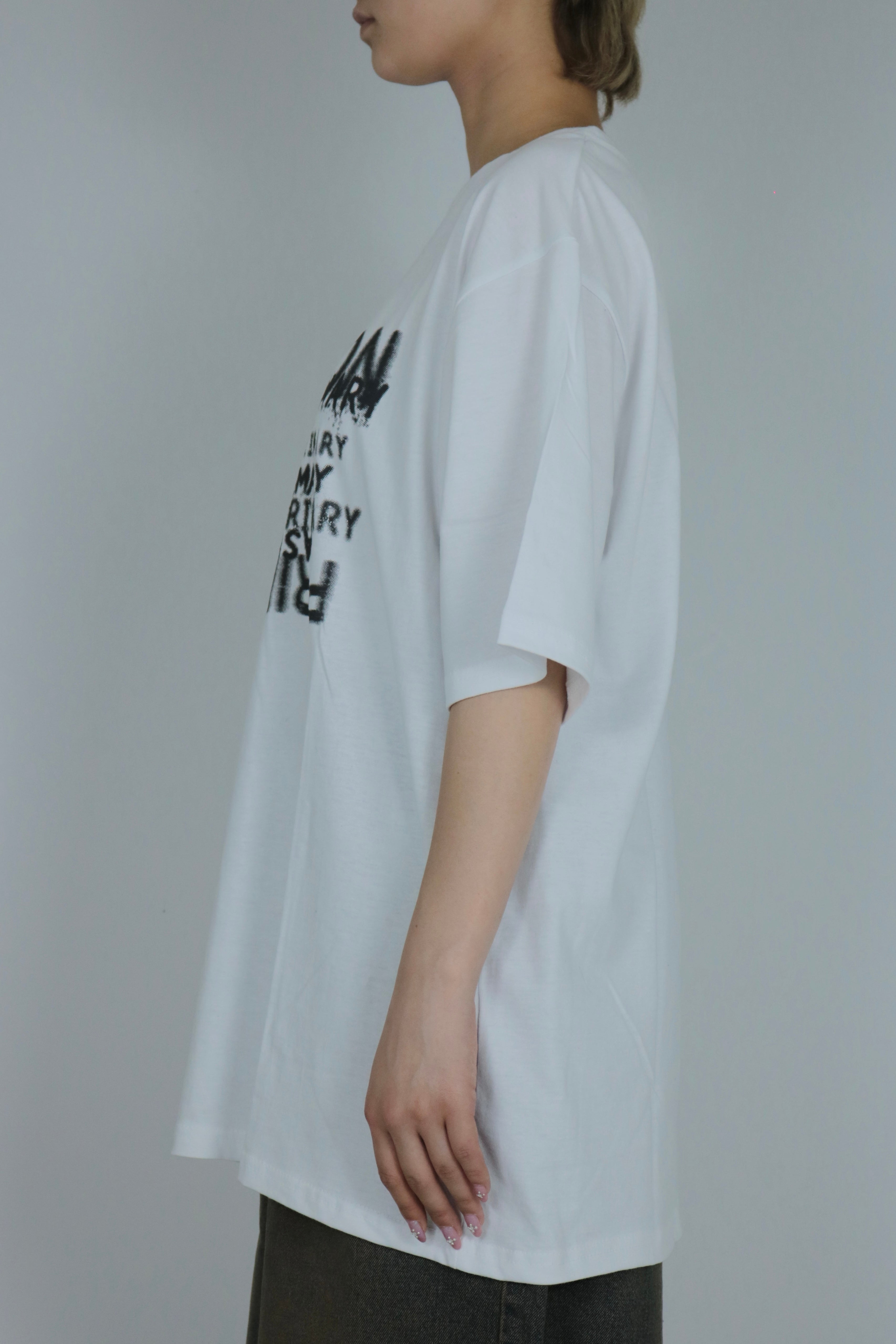 English lettering over size T