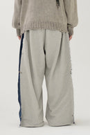 Side tuck denim docking sweat pants