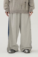 Side tuck denim docking sweat pants