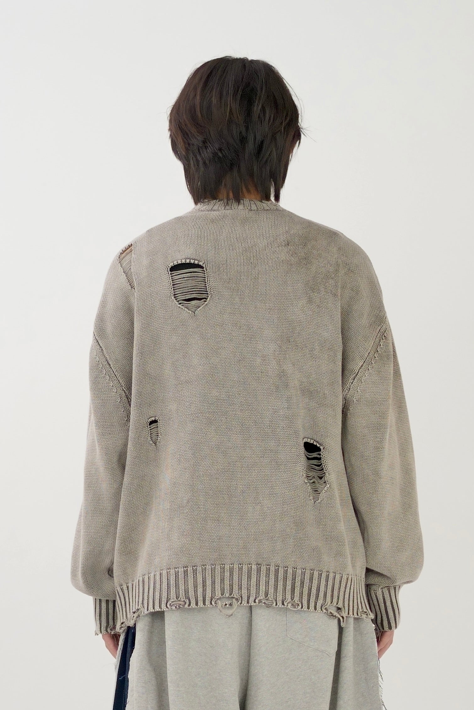 Damage design knit tops