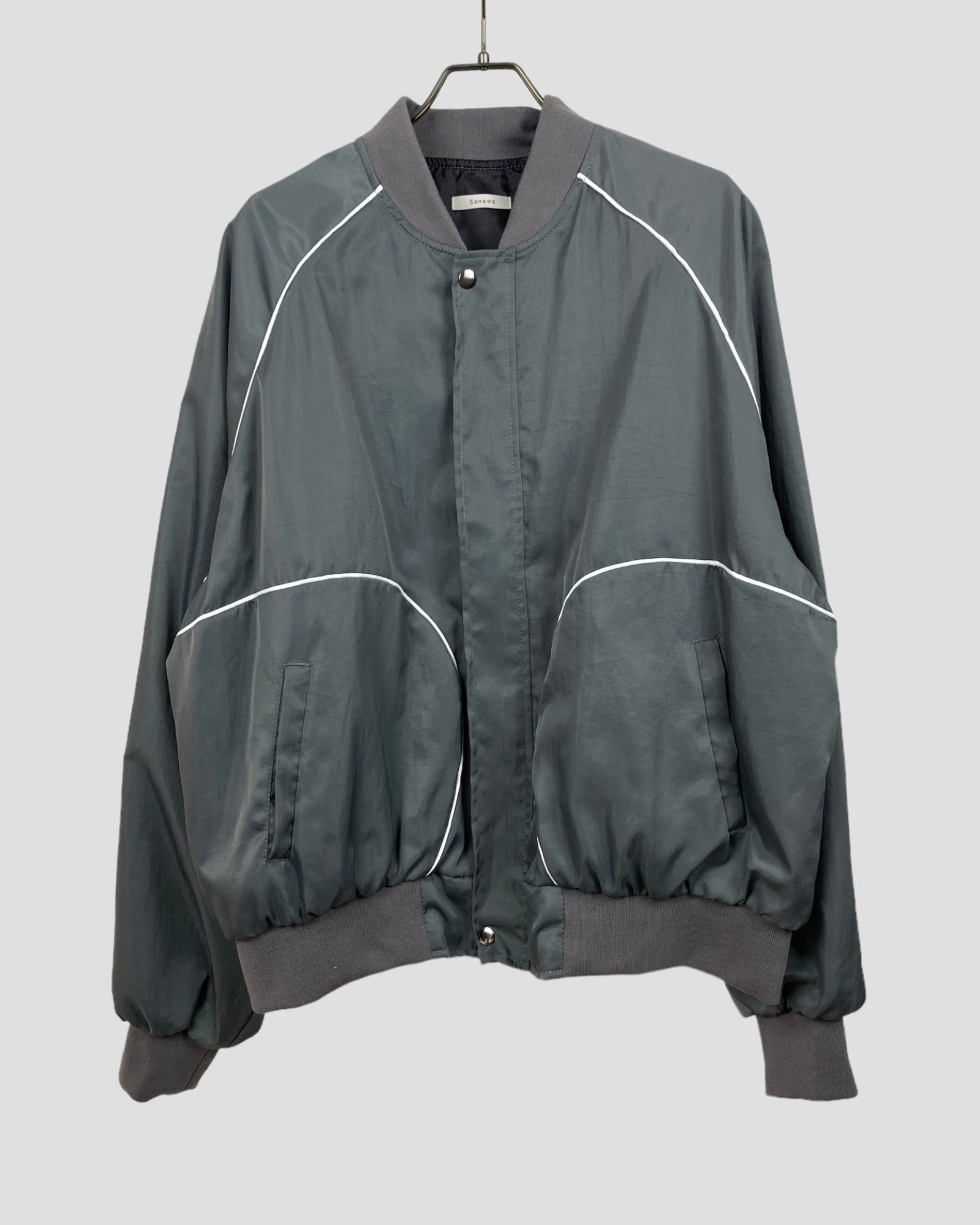 Nylon over size piping blouson