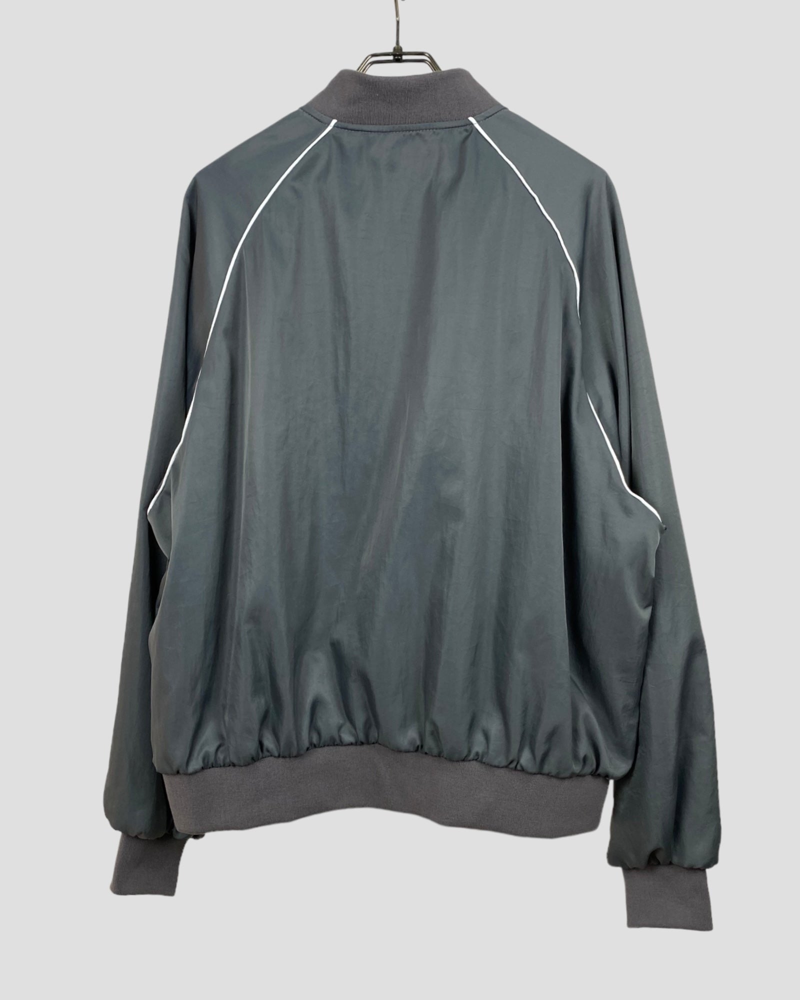 Nylon over size piping blouson